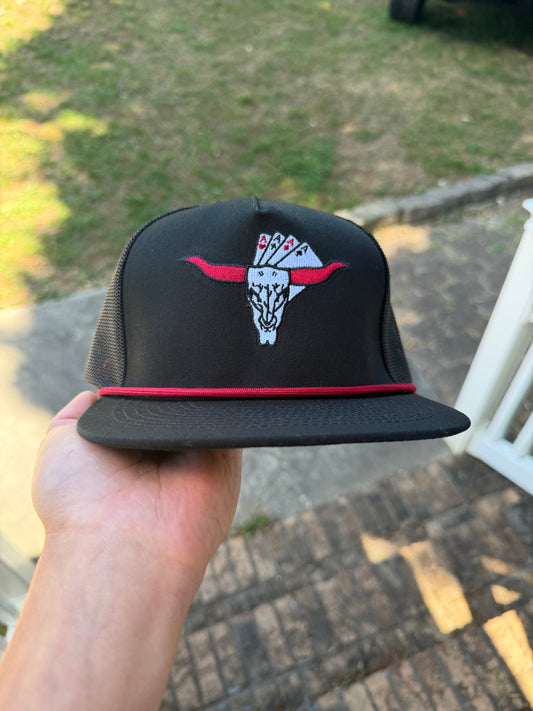 “The Rowdy Gambler” in black.