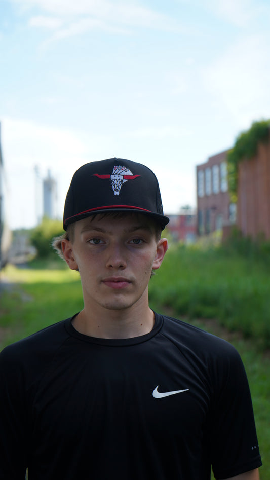 “The Rowdy Gambler” in black.